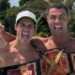 Edu Aguirre y Cristiano Ronaldo posan con el cinturón de campeón de La Velada del Año VI.