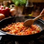 Cómo hacer un buen sofrito: la base de la cocina española (guía infalible)